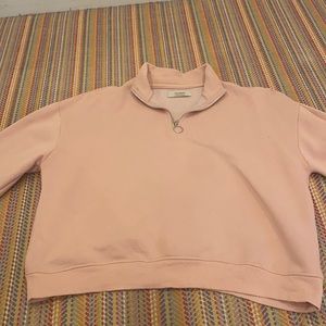 pink half zipped